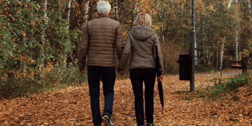 Older adults walking on trail